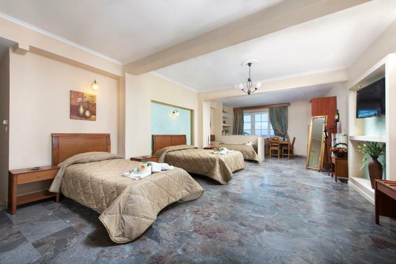 Aparthotel Mouse Island à Perama  Chambre photo